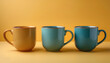 © Saddha Visual - vintage ceramic coffee mugs, isolated on a yellow pastel