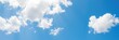 © retirementfun - Fluffy white clouds floating in a bright blue summer sky, outdoors, clouds