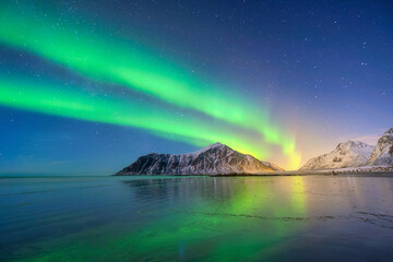 Wall Mural - aurora borealis in scandinavia. norway, lofoten islands. northern lights over the mountains. starry 