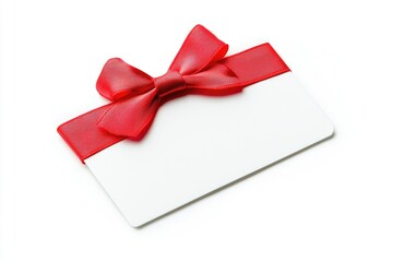 Poster - A simple yet elegant gift idea with a white card, tied with a red ribbon and adorned with a bow