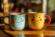 © alphaspirit - Two cute smiling mugs sitting on wooden table enjoying morning sunlight