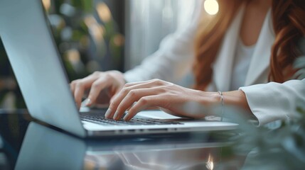 Poster - Businesswoman typing on laptop computer at office close up, woman working on modern technology in business center, corporate planning and social networking in professional environment