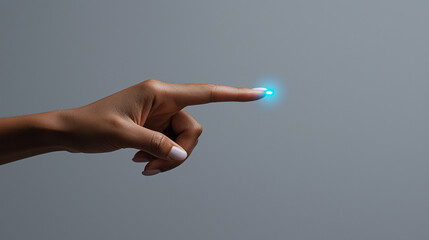 Leinwandbilder - Dynamic shot of hand with finger extended toward glowing blue light, showcasing sense of curiosity and interaction. elegant hand contrasts beautifully against neutral background