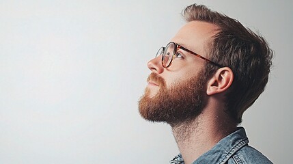 Wall Mural - Profile of a Thoughtful Man with Glasses