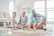 © peopleimages.com - Grandparents, toys and children in home for bonding, development and play games with portrait. Senior people, puzzle and kids in lounge for happy family, education and learning on weekend with relax