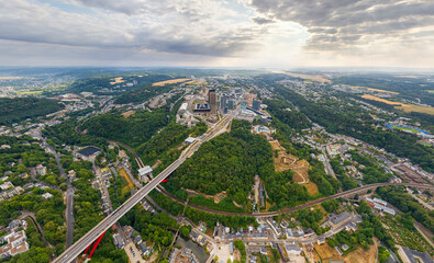 Wall Mural - Luxembourg City, Luxembourg. Panorama of the city. Summer day, cloudy weather. Aerial view