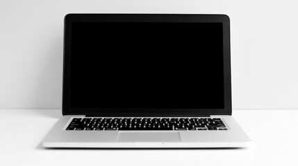 Poster - Image of a computer on a desk in a minimalist office to convey the concept of working and using technology in the workplace.