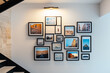 © multiform - The light illuminates artistic picture frames on the wall.