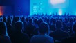 © TensorSpark - Audience at a business networking event with blue lighting, focusing on connection and collaboration.