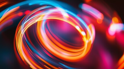 Poster - Vibrant light trails swirl in a dynamic circular pattern, creating a mesmerizing visual display of color and motion at night