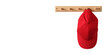 © MaskaRad - red baseball cap hangs on a wooden clothes rack, isolated on a white background and a copy space.
