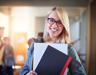 Poster - Woman, university student and happy with notebook on campus for education, higher learning and studies. Female person, portrait and smile or proud as college learner at corridor for knowledge