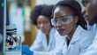 © bird_saranyoo - African researchers focusing on regenerative psychology methods, diverse team analyzing trauma recovery,