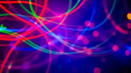 Wall Mural - Abstract Neon Light Trails with a Blurred Background of Vibrant Colors and Sparkling Lights