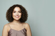 © artmim - Portrait of healthy female model with clean skin, make-up and perfect hairstyle against white studio wall background
