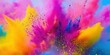© Veronika - Vibrant explosion of colored powder fills the air during a joyful celebration, showcasing a stunning mix of pink, yellow, and blue hues at an outdoor festival in bright daylight