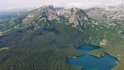Wall Mural - aerial view of famous black lake in mountain durmitor park at summer, montenegro, 4k