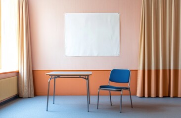 Poster - A white blank poster on the wall of an empty room with blue chairs and an orange table. The walls are peach colored, with a curtain on one side. The room is filled with daylight.