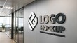 © tushar - logo mockup with 3D glossy metal on an office wall.