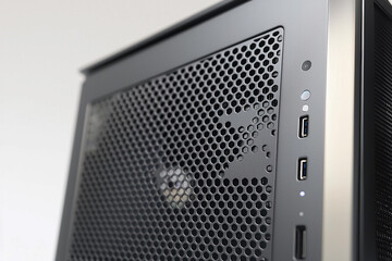 Fototapete - Close-up view of a modern computer case showcasing ports and design