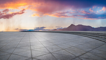 Wall Mural - empty square floor and mountain with sky clouds natural landscape at sunset. car background.