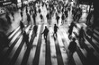 © Gatherina - Blurred people crossing the street in black and white