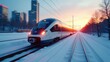 © realone952 - A high-speed passenger train travels through a metropolis in winter at sunset