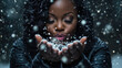 © wernerimages - A woman revels in the beauty of a snowy winter scene, enjoying the cool presence of snowflakes around her, symbolizing peace and wonder in the serene landscape.