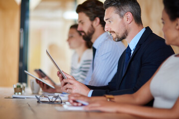 Poster - Seminar, tablet and business man with team in sales workshop, planning budget or discussion online. Digital technology, conference room and mature manager reading email, research or meeting in office