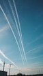 © Julija - Chemtrail conspiracy theory. Long-lasting condensation trails left in sky by high-flying aircraft are actually chemtrails consisting of chemical or biological agents, sprayed for nefarious purposes.