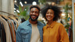 © EmmaStock - Cheerful couple shopping in an eco-conscious store, selecting sustainable clothing made from organic materials