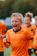 © Mselected - Young soccer player joyfully celebrates scoring during sunny practice