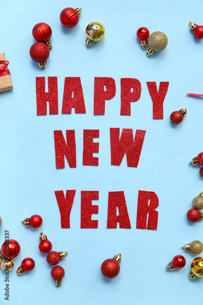 Text HAPPY NEW YEAR with Christmas balls on blue background