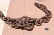 © shimon - Strong iron steel chain close up.