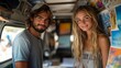 © Prostock-studio - A young couple is enjoying their time together inside a vintage van. The interior is adorned with colorful art and photographs while sunlight illuminates their happy expressions.