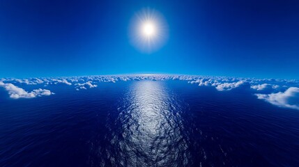 Wall Mural - a view of the sun shining over the ocean from an airplane window