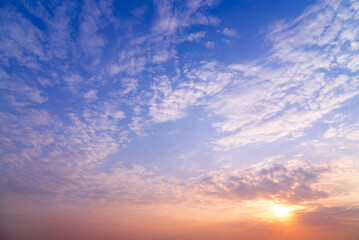 Wall Mural - sunset sky with rays of light shining clouds and sky background and texture