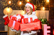 © be free - New Year party. cheerful girl share xmas gift. woman in santa hat present box. happy new year. Celebrating xmas with family. merry christmas. winter holidays and vacation. Christmas shopping