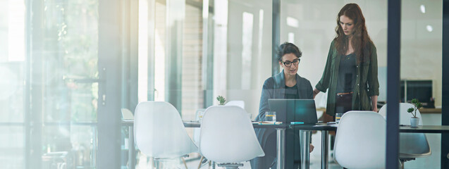 Boardroom, collaboration and mentor with woman employee in office together for meeting or planning. Conversation, glass and laptop with business people in professional workplace for discussion