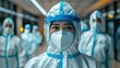 © somchai20162516 - Medical personnel wearing protective masks and full protective suits in a hospital, showing safe and professional work.