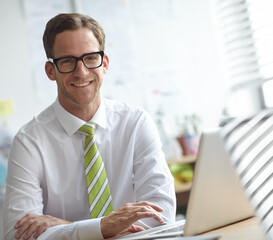 Aufkleber - Man, laptop and happy with portrait in office for typing, proposal or planning at media company. Person, writer and smile by computer for editing, article or pride with review at news agency in Spain