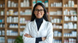 © Deepak - Confident Female Pharmacist in Pharmacy