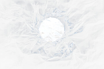 Aufkleber - A hole in black plastic revealing a blue and white globe.