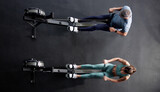 High Angle View OF Woman In Gym Using Rowing Machine