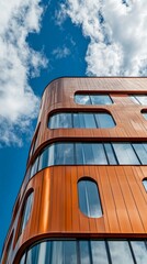 Poster - A tall building with a blue sky in the background