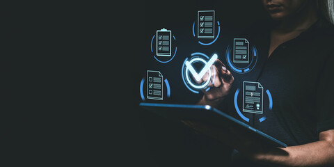 Poster - person using a tablet with digital checkboxes and documents on a