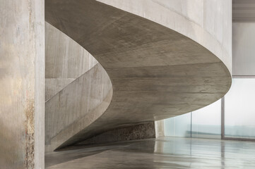 Wall Mural - A curving flight concrete spiral staircase at Blavatnik Building of Tate Modern Switch House extension. Interior main curved stair at Tate modern its distinctive perforated, lattice brickwork.