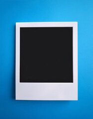 Poster - A single instant photo frame on pure empty blue background, mockup