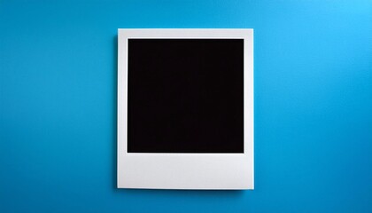 Poster - A single instant photo frame on pure empty blue background, mockup