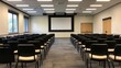 © tuiphotoengineer - Empty modern classroom or auditorium interior with rows of chairs table and large projection screen ready for a lecture presentation conference or other educational or corporate event